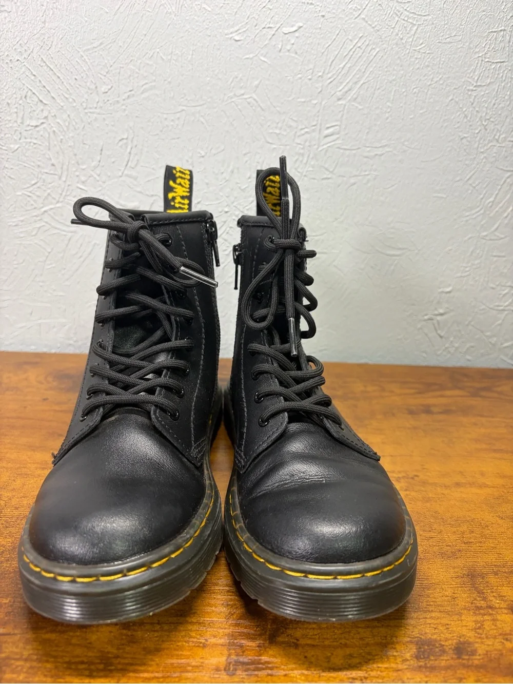 Dr. Martens Black Leather Boots with Yellow Accent
